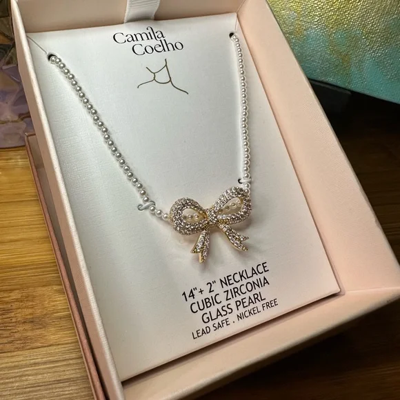 Camila Coelho Silver Cubic Zirconia Bow Necklace on strand of small faux pearls - Picture 7 of 10